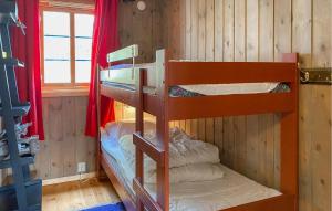 a bunk bed room with two bunk beds in it at 4 Bedroom Gorgeous Home In Bjorli in Bjorli