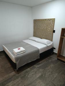 Postel nebo postele na pokoji v ubytování Hotel Prestige