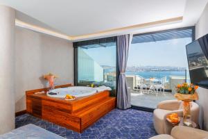 En eller flere senge i et værelse på Ring Stone Hotels Bosphorus - Special Class + 56 billeder