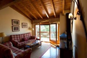 Posezení v ubytování La Cabana dels Esquirols