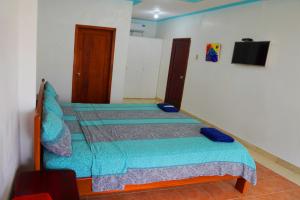 Letto o letti in una camera di Hotel Canoa´s Wonderland