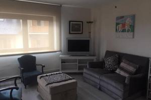 A seating area at Apartamento Central