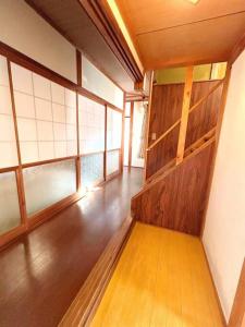 New Open !! 田舎の一棟貸 お庭でBBQやプール遊びができる貸切の宿 3ぴーす客房内的一张或多张床位