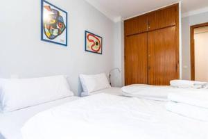 Posteľ alebo postele v izbe v ubytovaní Apartament el Llac
