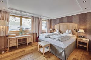 Letto o letti in una camera di Fernsicht Alpen-Apartments