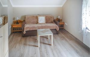 Posteľ alebo postele v izbe v ubytovaní Cozy Apartment In Jelesnia