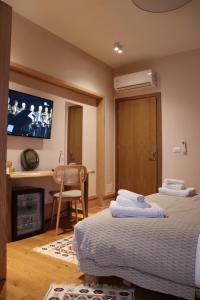 Postel nebo postele na pokoji v ubytování Velar Hotel Boutique + 31 fotografií
