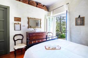 En eller flere senge i et værelse på Villa Francesca by PortofinoHomes + 78 billeder