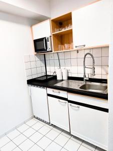Kuchyň nebo kuchyňský kout v ubytování Familienwohnung 2 Zimmer, Küche, für 4 Personen + 6 fotografií