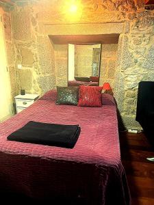 En eller flere senge i et værelse på Apartamento en Casco Histórico de Vigo