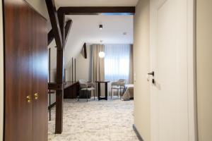 Posteľ alebo postele v izbe v ubytovaní Ołowianka B&B