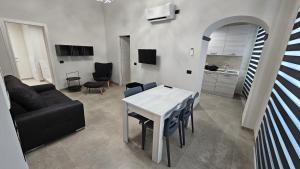 TV a/nebo společenská místnost v ubytování Residenza Novi