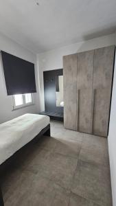 Postel nebo postele na pokoji v ubytování Residenza Novi
