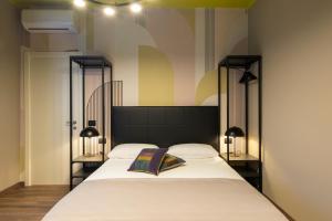 Voodi või voodid majutusasutuse The Time -Home & Hotel- toas