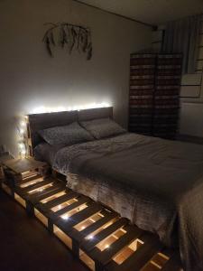 Letto o letti in una camera di Friends Hostel