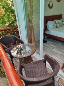 Postel nebo postele na pokoji v ubytování CiNta Hotel