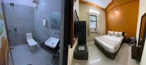 ein Schlafzimmer mit einem Bett und ein Badezimmer mit einer Dusche in der Unterkunft The Tiger Heritage in Sawāi Mādhopur