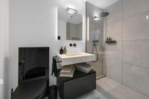 Koupelna v ubytování Ferienwohnung Ascona Vista Verde + 9 fotografií