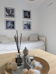 Postel nebo postele na pokoji v ubytování Appartement cosy au calme à cote du zoo avec balcon et parking securisé + 5 fotografií