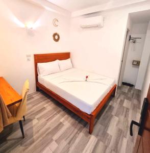 Postel nebo postele na pokoji v ubytování CiNta Hotel + 22 fotografií