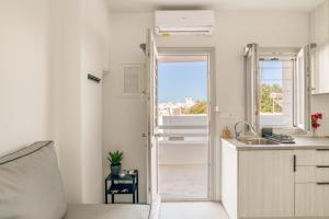 Sail in apt in the heart of Naousa廚房或簡易廚房
