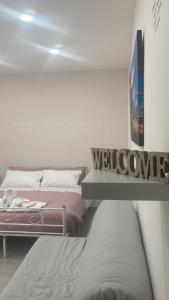 Postel nebo postele na pokoji v ubytování Una Notte a Napoli