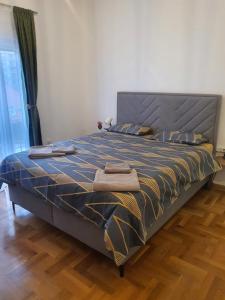 Krevet ili kreveti u jedinici u okviru objekta Apartman Astra Nikšić
