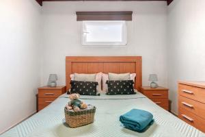 Krevet ili kreveti u jedinici u okviru objekta Playa del Hombre