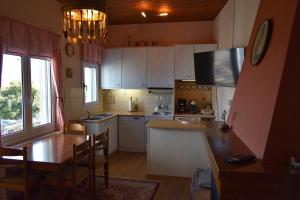 Kuchyňa alebo kuchynka v ubytovaní Holiday Cottage