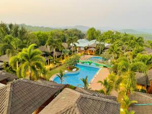 an aerial view of a resort with a swimming pool at The Four Season Beach Resort - Best Selling Property in Gokarna in Gokarna