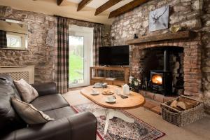 Posezení v ubytování Crofters Cottage, Press Mains Farm Cottage