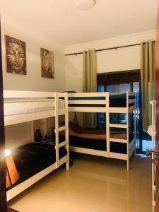 Poschodová posteľ alebo postele v izbe v ubytovaní H2byJK-Happy Homes