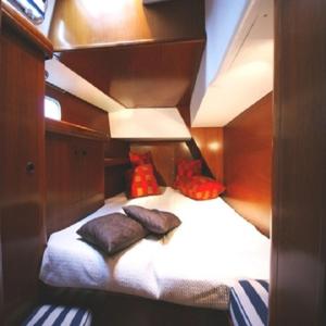 a small room with a bed on a boat at Day Sailing, Sailing Experience and Houseboat in Gros Islet