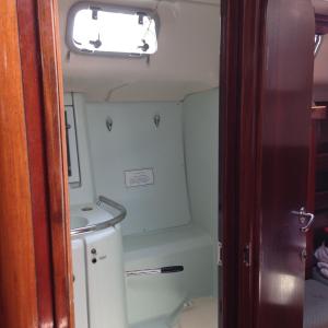 a small bathroom with a sink and a toilet at Day Sailing, Sailing Experience and Houseboat in Gros Islet