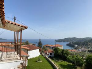 a view of the ocean from a house at Valmas village in Skiathos Town