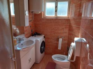 Koupelna v ubytování Apartment Singa + 27 fotografií
