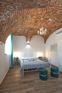 Voodi või voodid majutusasutuse Palazzo Campia toas