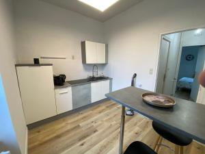 Kuchyň nebo kuchyňský kout v ubytování 43 Proche centre