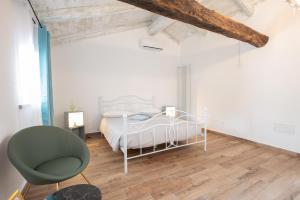Postel nebo postele na pokoji v ubytování Palazzo Campia
