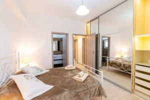 Postel nebo postele na pokoji v ubytování Mariangelo House