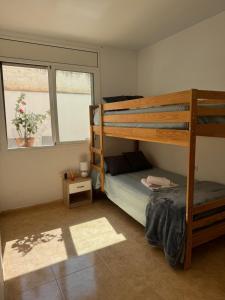Postel nebo postele na pokoji v ubytování Apartamento Los Peces