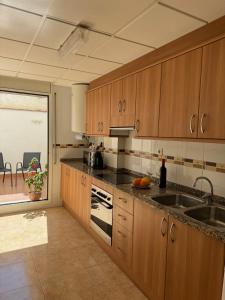 Kuchyň nebo kuchyňský kout v ubytování Apartamento Los Peces