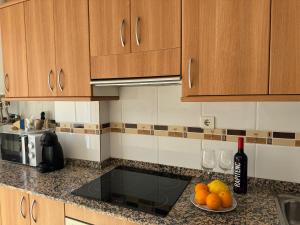 Kuchyň nebo kuchyňský kout v ubytování Apartamento Los Peces