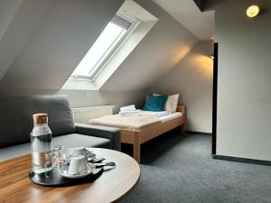 Voodi või voodid majutusasutuse Hotel George Vienna toas +37 fotot
