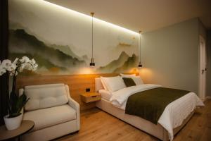 Postel nebo postele na pokoji v ubytování Oro Inn Hotel