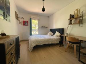 Ένα ή περισσότερα κρεβάτια σε δωμάτιο στο Maison Aix la grande Duranne