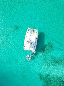 an overhead view of a boat in the water at Catamaran in San Blás Islands, private boat in Waisalatupo