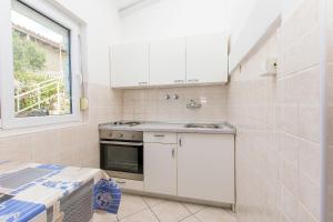 Kuchyňa alebo kuchynka v ubytovaní Apartment Terezija