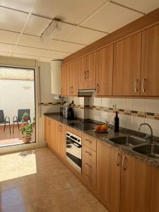 Kuchyň nebo kuchyňský kout v ubytování Apartamento Los Peces