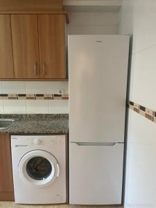Kuchyň nebo kuchyňský kout v ubytování Apartamento Los Peces